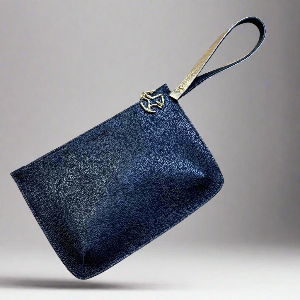 Cavell clutch / bag tidy in black veg tanned leather with gold wridst strap-handsewn craftmanship- Keep - Studio