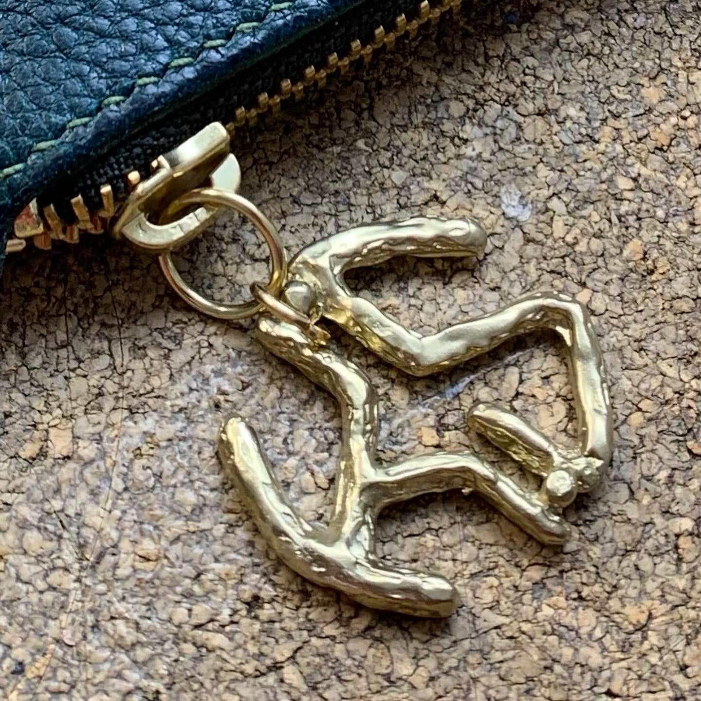 Cavell clutch close up of the KS brass zip pull Keep - Studio