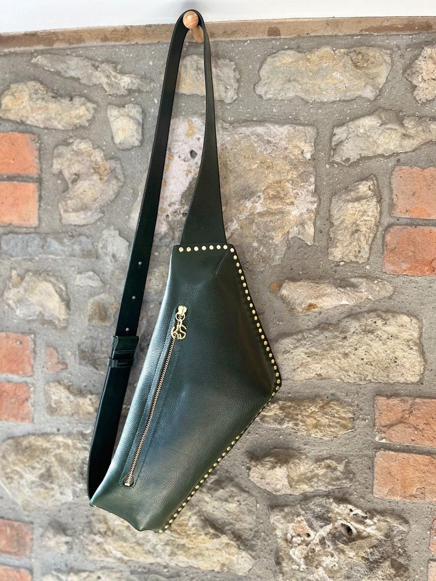 green handmadebum bag with gold studs and zip