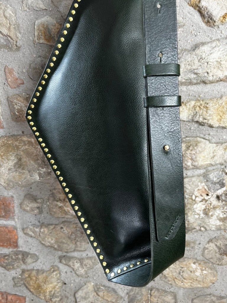 green cross body bag showing adjustable strap