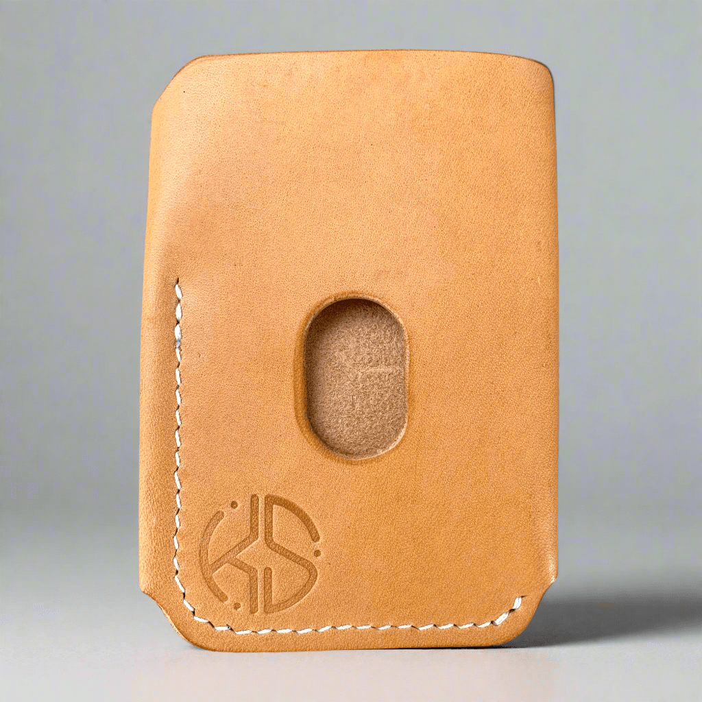 The back of the wrap card wallet by keep-studio, showing. thumb hole and embossed logo