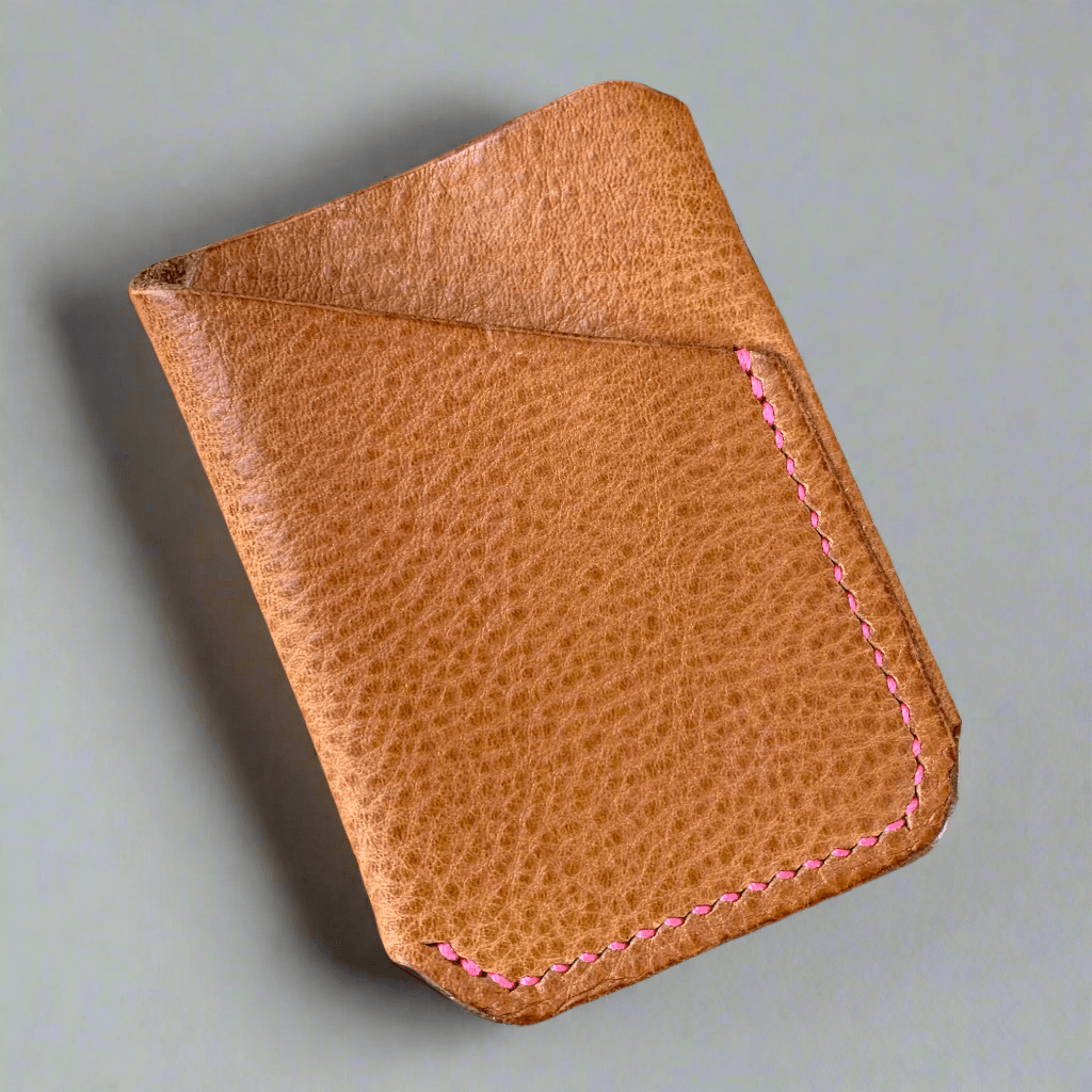 Soft textured leather card wallet in light tan with pink hand stitching