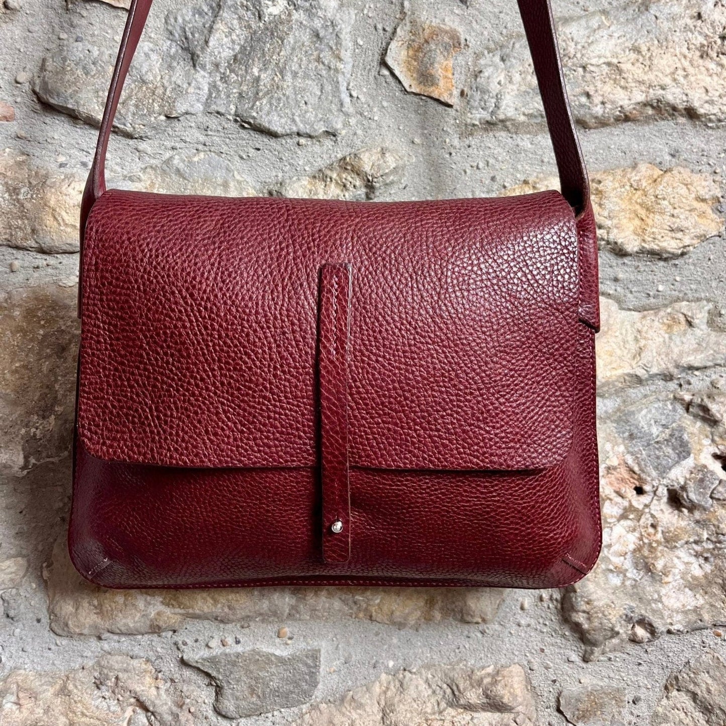 Keep-Studio barton bag in burgundy leather with brass hardware and adjustable strap 